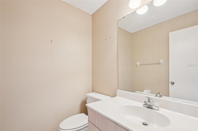 Enjoy refined living in this elegant 3-bedroom, 2.5-bath home on Falcon Watch Golf Club in Florida - for sale on GolfHomes.com, golf home, golf lot