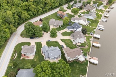 Stop the car! Updated 4 bedroom, 2 bath home tucked away in a on Lake Saint Louis Par 3 in Missouri - for sale on GolfHomes.com, golf home, golf lot