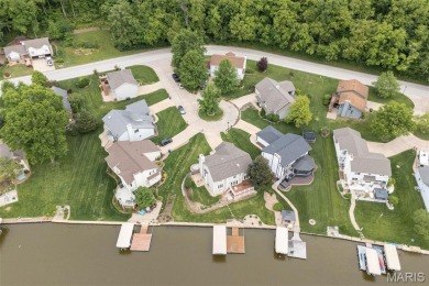 Stop the car! Updated 4 bedroom, 2 bath home tucked away in a on Lake Saint Louis Par 3 in Missouri - for sale on GolfHomes.com, golf home, golf lot