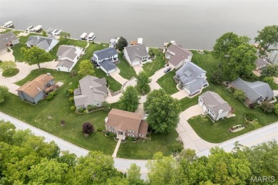Stop the car! Updated 4 bedroom, 2 bath home tucked away in a on Lake Saint Louis Par 3 in Missouri - for sale on GolfHomes.com, golf home, golf lot