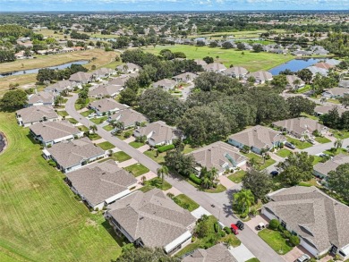 Enjoy refined living in this elegant 3-bedroom, 2.5-bath home on Falcon Watch Golf Club in Florida - for sale on GolfHomes.com, golf home, golf lot