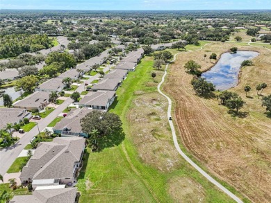 Enjoy refined living in this elegant 3-bedroom, 2.5-bath home on Falcon Watch Golf Club in Florida - for sale on GolfHomes.com, golf home, golf lot