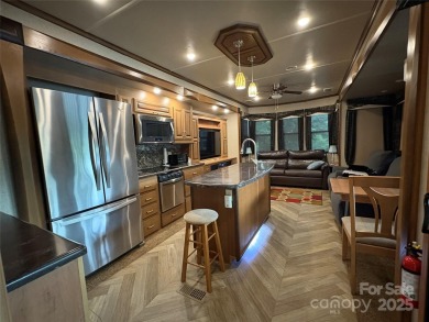 Spacious RV on deeded lot inside *BSR*. Boat & golf cart on Old North State Club at Uwharrie Point Golf community in North Carolina - for sale on GolfHomes.com, golf home, golf lot