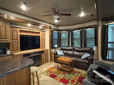 Spacious RV on deeded lot inside *BSR*. Boat & golf cart on Old North State Club at Uwharrie Point Golf community in North Carolina - for sale on GolfHomes.com, golf home, golf lot