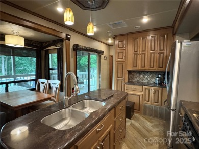 Spacious RV on deeded lot inside *BSR*. Boat & golf cart on Old North State Club at Uwharrie Point Golf community in North Carolina - for sale on GolfHomes.com, golf home, golf lot