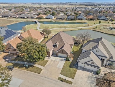 Experience elevated living in this stunning single-story home on Wildhorse Golf Club of Robson Ranch in Texas - for sale on GolfHomes.com, golf home, golf lot