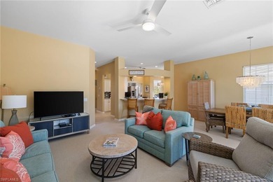 This spacious, well-designed second-floor end-unit is located in on Windstar on Naples Bay in Florida - for sale on GolfHomes.com, golf home, golf lot
