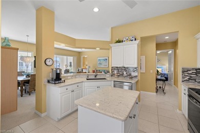 This spacious, well-designed second-floor end-unit is located in on Windstar on Naples Bay in Florida - for sale on GolfHomes.com, golf home, golf lot