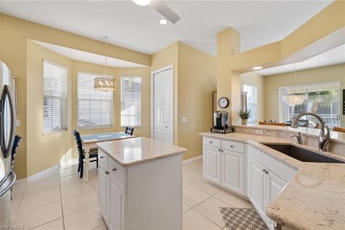 This spacious, well-designed second-floor end-unit is located in on Windstar on Naples Bay in Florida - for sale on GolfHomes.com, golf home, golf lot