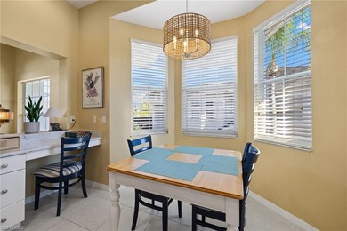 This spacious, well-designed second-floor end-unit is located in on Windstar on Naples Bay in Florida - for sale on GolfHomes.com, golf home, golf lot