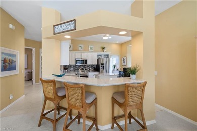 This spacious, well-designed second-floor end-unit is located in on Windstar on Naples Bay in Florida - for sale on GolfHomes.com, golf home, golf lot