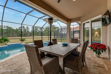 Modern elegance meets serene golf course views in this like-new on Venetian Bay Golf Course in Florida - for sale on GolfHomes.com, golf home, golf lot