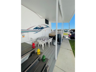 FLORIDA WATERFRONT PROPERTY. AFFORDABLE EASY LIVING. WELCOME TO on Cypress Point RV Golf Club in Florida - for sale on GolfHomes.com, golf home, golf lot