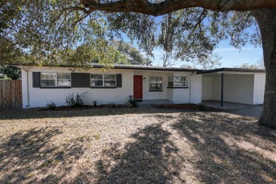 Under contract-accepting backup offers. Charming single-family on Interlachen Country Club in Florida - for sale on GolfHomes.com, golf home, golf lot