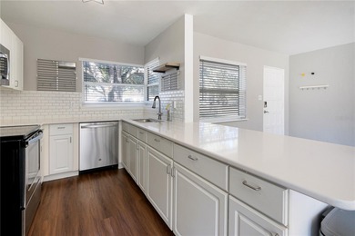 Under contract-accepting backup offers. Charming single-family on Interlachen Country Club in Florida - for sale on GolfHomes.com, golf home, golf lot