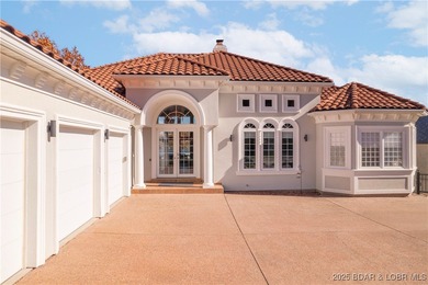 Welcome to 764 Via Del Lago in the prestigious Porto Cima on The Club At Porto Cima in Missouri - for sale on GolfHomes.com, golf home, golf lot