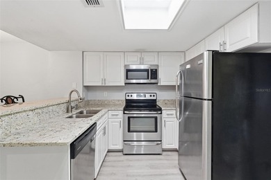 Welcome to this beautifully updated two-bedroom on Innisbrook Resort and Golf Club in Florida - for sale on GolfHomes.com, golf home, golf lot