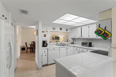LOWEST PRICED THREE BEDROOM UNIT!! TOP SCHOOL DISTRICT! Spacious on  in Florida - for sale on GolfHomes.com, golf home, golf lot