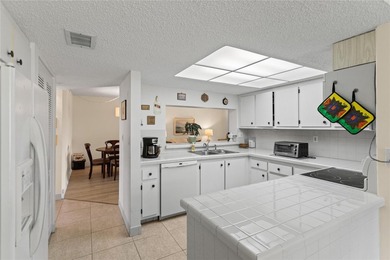 LOWEST PRICED THREE BEDROOM UNIT!! TOP SCHOOL DISTRICT! Spacious on  in Florida - for sale on GolfHomes.com, golf home, golf lot