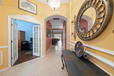 Beautiful 3-bedroom, 2.5-bath home with a large screened-in pool on Hunters Creek Golf Course in Florida - for sale on GolfHomes.com, golf home, golf lot