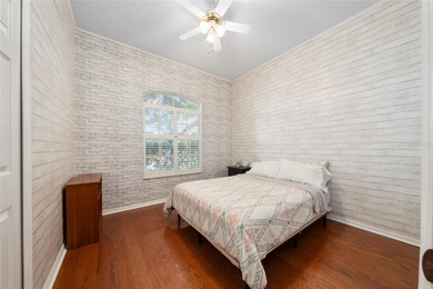 Beautiful 3-bedroom, 2.5-bath home with a large screened-in pool on Hunters Creek Golf Course in Florida - for sale on GolfHomes.com, golf home, golf lot