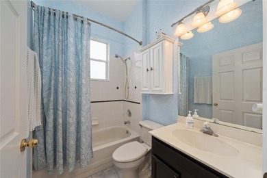 Beautiful 3-bedroom, 2.5-bath home with a large screened-in pool on Hunters Creek Golf Course in Florida - for sale on GolfHomes.com, golf home, golf lot