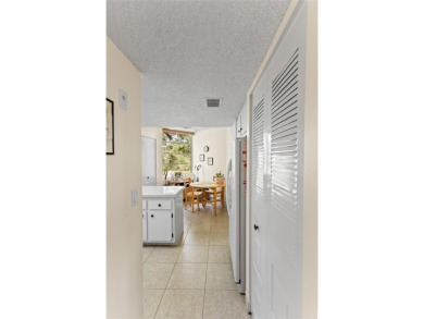 LOWEST PRICED THREE BEDROOM UNIT!! TOP SCHOOL DISTRICT! Spacious on  in Florida - for sale on GolfHomes.com, golf home, golf lot