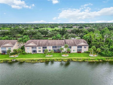 Stunning golf course and lake views await you in this on Heritage Oaks Golf and Country Club in Florida - for sale on GolfHomes.com, golf home, golf lot