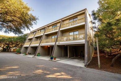 Oceanview condo with peaks of the ocean surrounded by the on The Country Club of the Crystal Coast in North Carolina - for sale on GolfHomes.com, golf home, golf lot