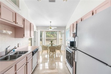 LOWEST-PRICED HOME IN RIVIERA GOLF ESTATES! Nestled within this on Riviera Golf Club in Florida - for sale on GolfHomes.com, golf home, golf lot