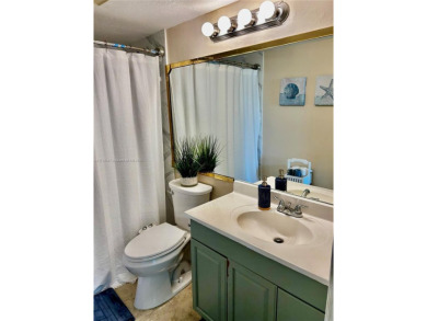 Beautiful first-floor unit featuring 1 bedroom and 1.5 bathrooms on Hollybrook Golf and Tennis Club  in Florida - for sale on GolfHomes.com, golf home, golf lot