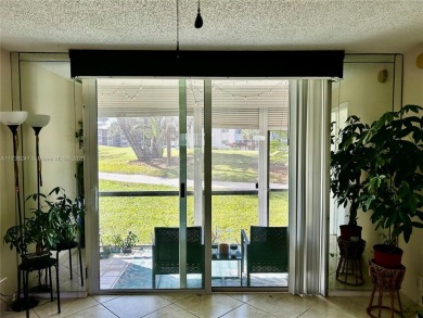 Beautiful first-floor unit featuring 1 bedroom and 1.5 bathrooms on Hollybrook Golf and Tennis Club  in Florida - for sale on GolfHomes.com, golf home, golf lot