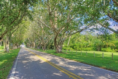 This spacious end unit in beautiful Eaglewood Country Club is on Eagle Wood Golf Course in Florida - for sale on GolfHomes.com, golf home, golf lot