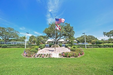 This spacious end unit in beautiful Eaglewood Country Club is on Eagle Wood Golf Course in Florida - for sale on GolfHomes.com, golf home, golf lot