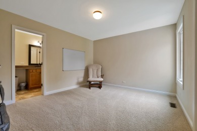 Custom home with 4 spacious bedrooms, 4.5 bathrooms nestled on on Blackstone Golf Club in Illinois - for sale on GolfHomes.com, golf home, golf lot