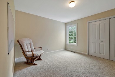 Custom home with 4 spacious bedrooms, 4.5 bathrooms nestled on on Blackstone Golf Club in Illinois - for sale on GolfHomes.com, golf home, golf lot