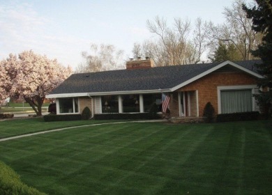 Welcome to this stunning 3-bedroom, 3-bathroom home on Champaign Country Club in Illinois - for sale on GolfHomes.com, golf home, golf lot