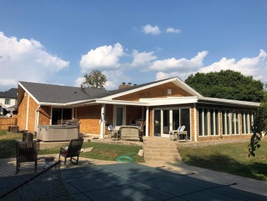 Welcome to this stunning 3-bedroom, 3-bathroom home on Champaign Country Club in Illinois - for sale on GolfHomes.com, golf home, golf lot