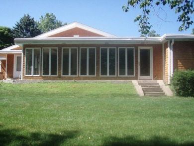 Welcome to this stunning 3-bedroom, 3-bathroom home on Champaign Country Club in Illinois - for sale on GolfHomes.com, golf home, golf lot