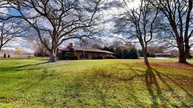 Fantastic all main level living house with screened porch and on Etowah Valley Golf Club in North Carolina - for sale on GolfHomes.com, golf home, golf lot