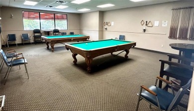 Beautiful first-floor unit featuring 1 bedroom and 1.5 bathrooms on Hollybrook Golf and Tennis Club  in Florida - for sale on GolfHomes.com, golf home, golf lot
