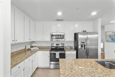 Welcome to 17118 Vardon Terrace #108, where luxury meets leisure on Lakewood National Golf Club in Florida - for sale on GolfHomes.com, golf home, golf lot