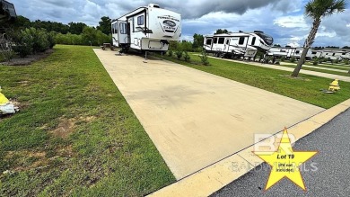 This lot is located on the north edge of the resort and borders on Gulf Links Executive Golf Course in Alabama - for sale on GolfHomes.com, golf home, golf lot
