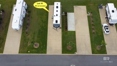 This lot is located on the north edge of the resort and borders on Gulf Links Executive Golf Course in Alabama - for sale on GolfHomes.com, golf home, golf lot