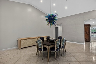 Casual elegance is evident the moment you enter this stunning on Boca Greens Country Club in Florida - for sale on GolfHomes.com, golf home, golf lot