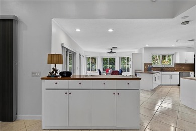 Casual elegance is evident the moment you enter this stunning on Boca Greens Country Club in Florida - for sale on GolfHomes.com, golf home, golf lot