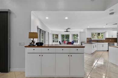 Casual elegance is evident the moment you enter this stunning on Boca Greens Country Club in Florida - for sale on GolfHomes.com, golf home, golf lot