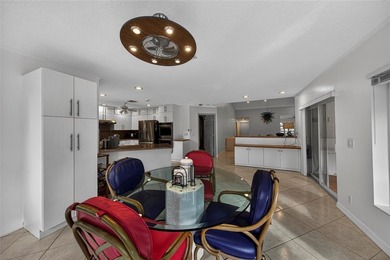 Casual elegance is evident the moment you enter this stunning on Boca Greens Country Club in Florida - for sale on GolfHomes.com, golf home, golf lot