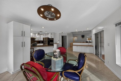 Casual elegance is evident the moment you enter this stunning on Boca Greens Country Club in Florida - for sale on GolfHomes.com, golf home, golf lot