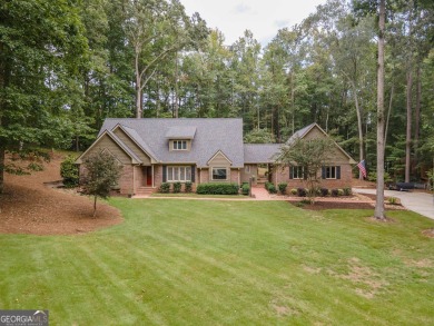 PERFECT LOCATION and MOVE-IN READY with wonderful curb appeal on on Canongate At Flat Creek Club in Georgia - for sale on GolfHomes.com, golf home, golf lot